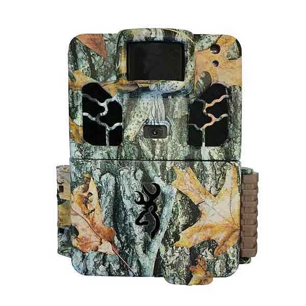 A camouflage trail camera with a display screen and two black lenses on the front.