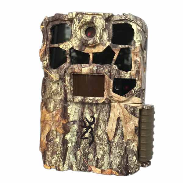 A camouflage-patterned wildlife camera with a display screen and multiple lens ports.