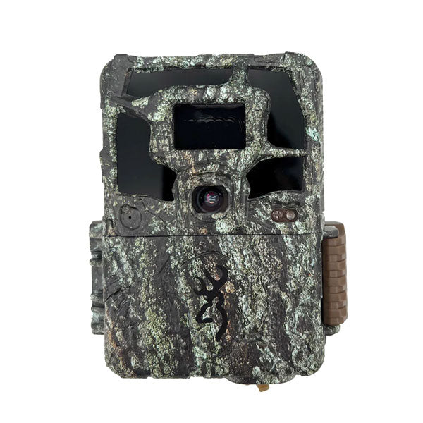 A camouflage Browning Dark Ops HD Pro X 1080 trail camera with a display screen and camera lens visible.