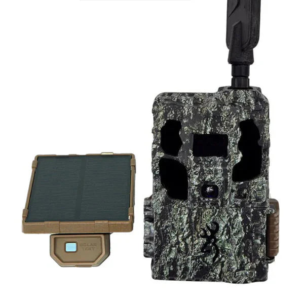 Camouflage hunting camera with solar panel on a white background