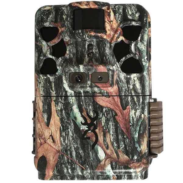 A camouflage-patterned Browning PATRIOT trail camera with visible lens holes and a battery compartment.