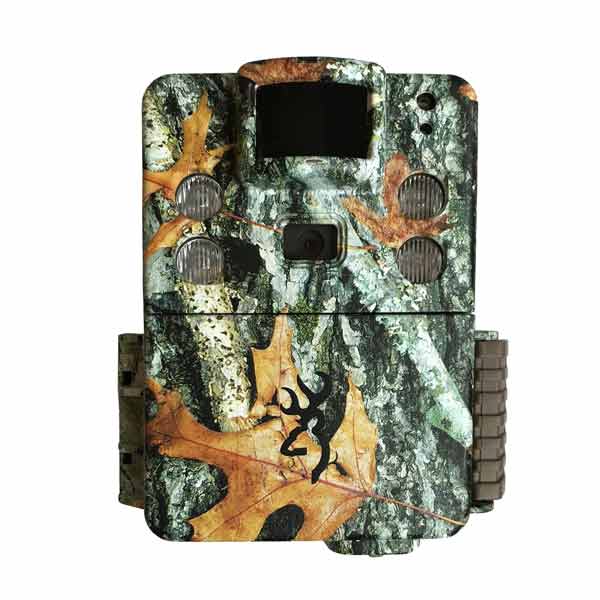 A camouflage-patterned Browning Strike Force APEX trail camera with visible lens and sensor components.